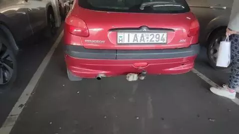 AI Video from prompt: The car is standing still, shooting flames from 