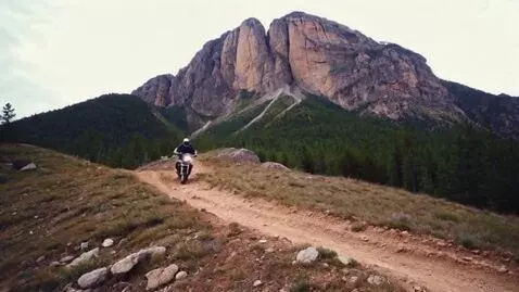 AI Video from prompt: cinematic trail motorbike adventure on a rocky h