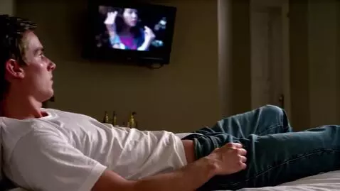 AI Video from prompt: A young man, 20 years old, is lying on his back 