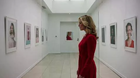 AI Video from prompt: [0-3s]: Cinematic side-tracking shot, 40yo blond