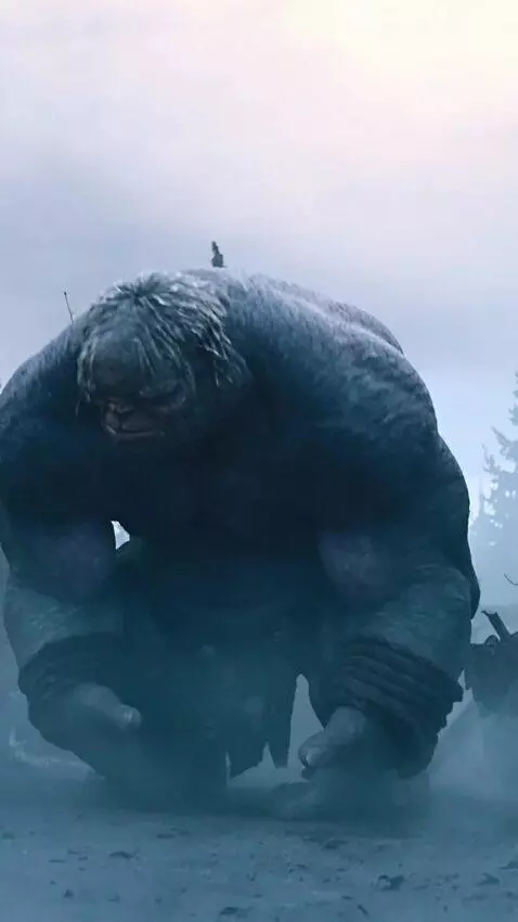 AI Video from prompt: The giant pick up a boulder and throws it