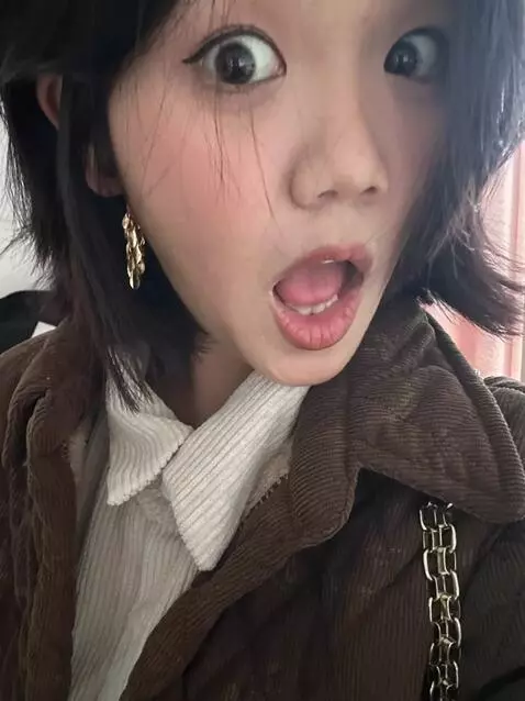 AI Video from prompt: Roll one's eyes, open one's mouth, and stick out