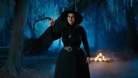 AI Video from prompt: a slim sexy witch magically becomes massively fa