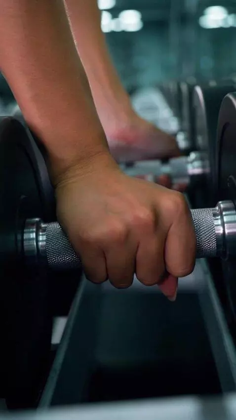 AI Video from prompt: Extreme close-up macro shot of a woman's hands g