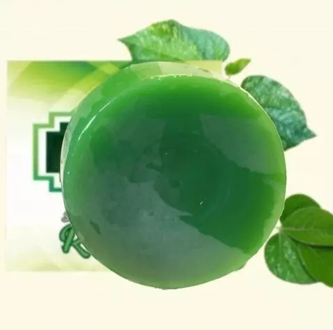 AI Video from prompt: The soap image zooms in and out, then a hand hol