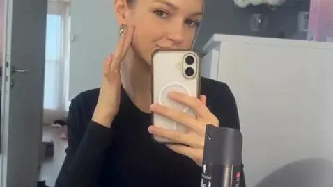 AI Video from prompt: shy smile, slow head movement