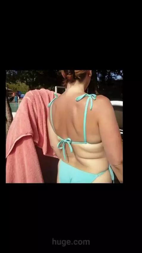 AI Video from prompt: The woman turns around and shows off her bikini