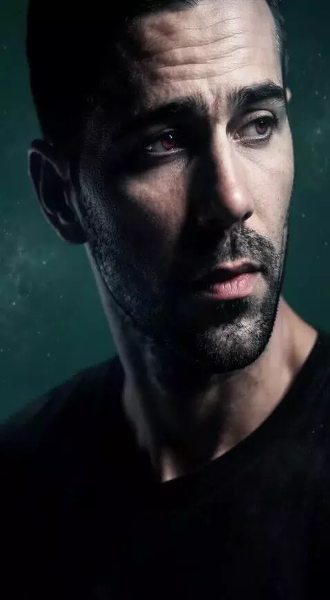 AI Video from prompt: Cinematic close-up of a man in dark moody lighti