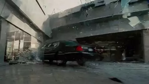 AI Video from prompt: A dirty black limousine drives down a road crack