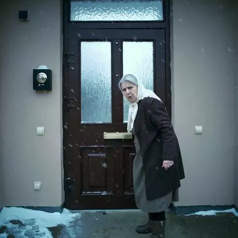 AI Video from prompt: A Russian grandmother knocks down the door of a 