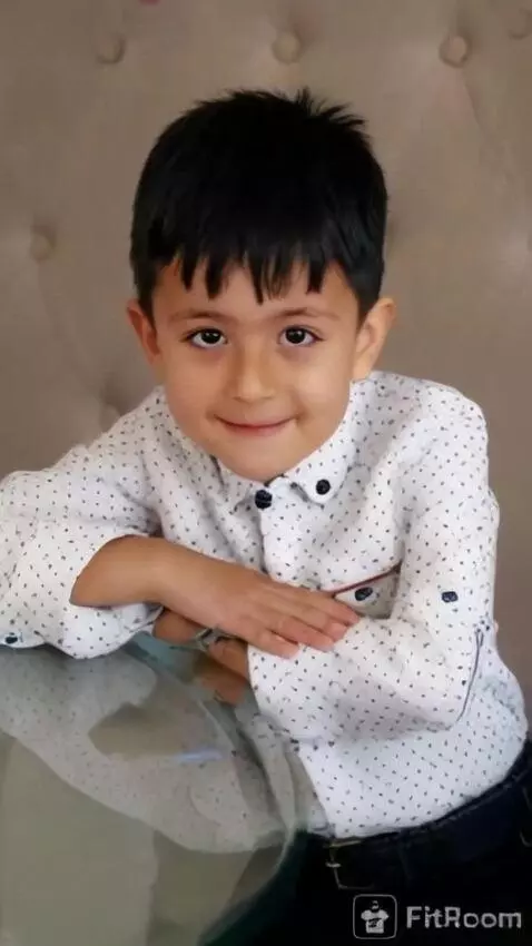 AI Video from prompt: A child pops a large orange balloon with a needl