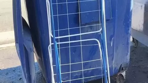 AI Video from prompt: make that metal dryer fly away into the sky