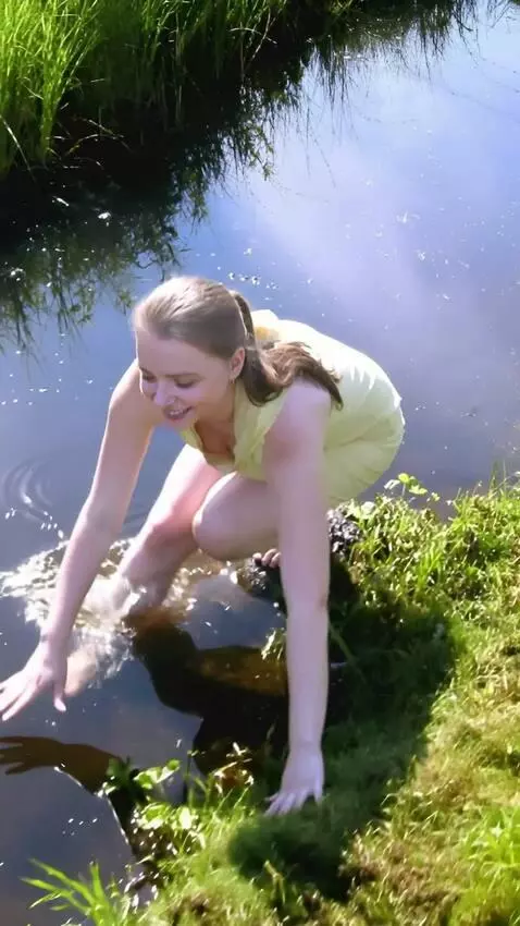 AI Video from prompt: the girl in a skirt gets on her kness and crawli