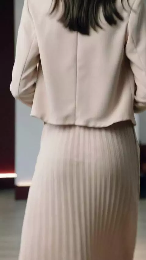 AI Video from prompt: Use the provided outfit as reference. Do not cha