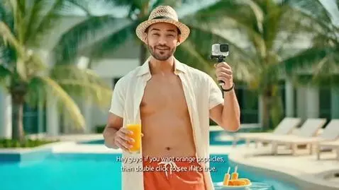 AI Video from prompt: The beauty man wearing orange swimming suit wear