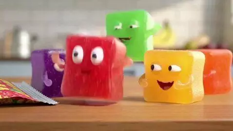 AI Video from prompt: make a video of fruit chews snacks coming to lif