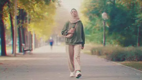 AI Video from prompt: a skinny arab woman show her big feet, real amat