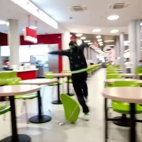 AI Video from prompt: He runs very fast to the KFC counter, knocking o