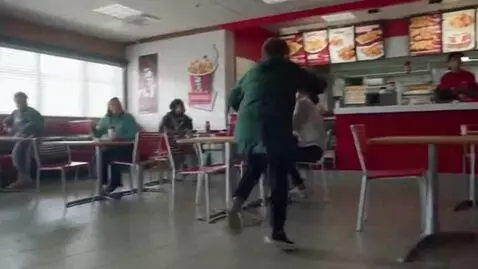 AI Video from prompt: He runs very fast to the KFC counter, knocking o