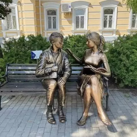 AI Video from prompt: The man takes the book from the girl and starts 