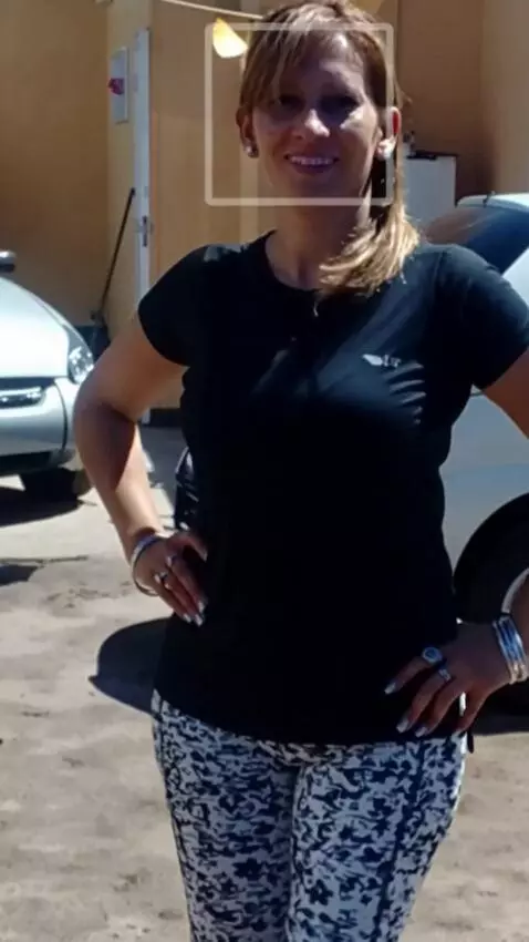 AI Video from prompt: The woman turns around showing off her clothes