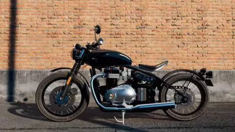 AI Video from prompt: A static cinematic shot of a black custom motorc