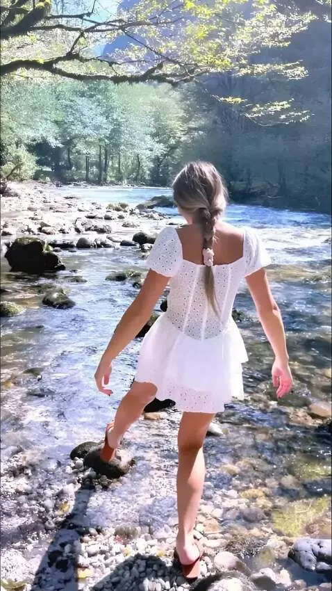 AI Video from prompt: A girl braces herself with her elbows and climbs