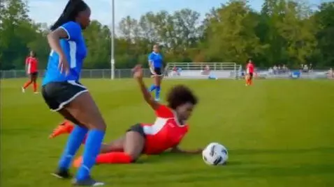 AI Video from prompt: Black curvy women wearing tight soccer outfit (m