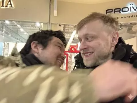 AI Video from prompt: make them both hug