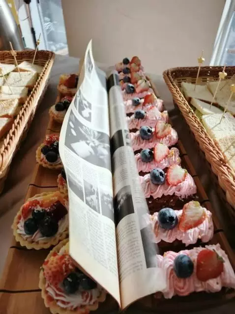 AI Video from prompt: A cinematic scene begins with a newspaper placed