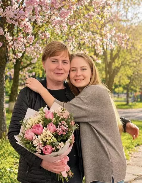 AI Video from prompt: daughter hugs and  her mother
