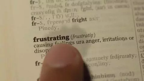 AI Video from prompt: Man finds the word called “Frustrating” in the d