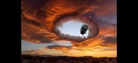 AI Video from prompt: the hole opens in the clouds and Ann immense wha