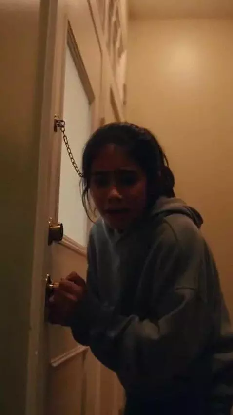 AI Video from prompt: 🎬 Title: “Don’t Open the Door”  Style: cinematic