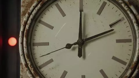 AI Video from prompt: 8K close-up of bunker clock, camera tilts second
