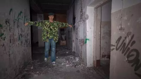 AI Video from prompt: The man in the photo walks towards the camera, r
