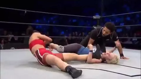 AI Video from prompt: woman wrestling fight ends in leg splits hold