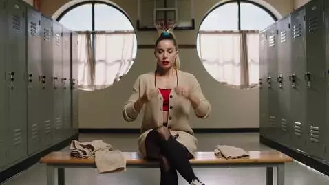 AI Video from prompt: a nerdy college girl transforms into a sexy bimb