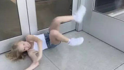 AI Video from prompt: Girl rolls around and crawls away