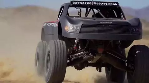 AI Video from prompt: An action packed, cinematic shot of a monster tr