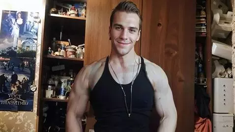 AI Video from prompt: An athletically built handsome brutal man with a