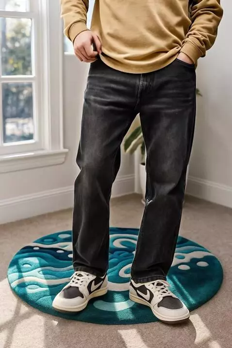 AI Video from prompt: A young man standing relaxed in a cozy, sunlit m