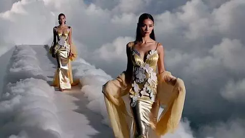 AI Video from prompt: two fashion models walking in clouds wearing sur