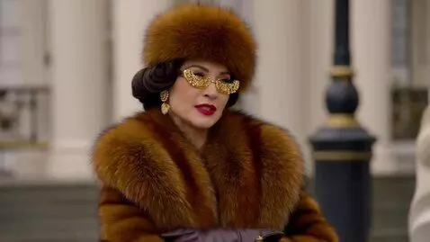 AI Video from prompt: A woman in a luxurious mink coat with thick, plu