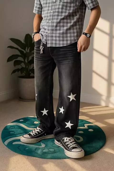 AI Video from prompt: A stylish male model wearing loose black jeans w