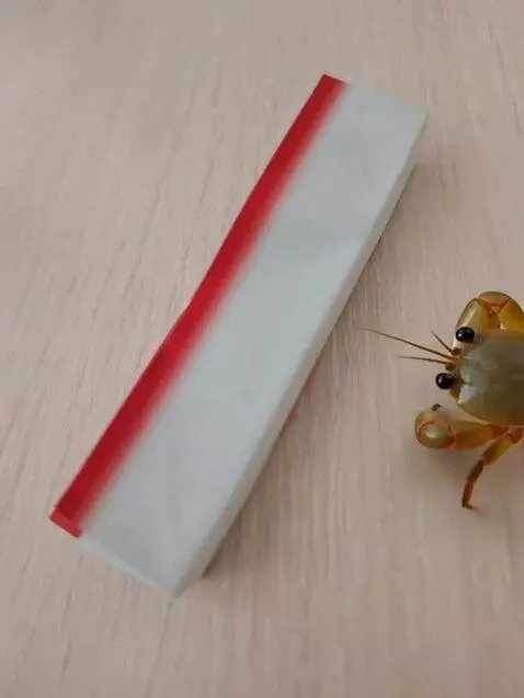 AI Video from prompt: crab takes away crab stick