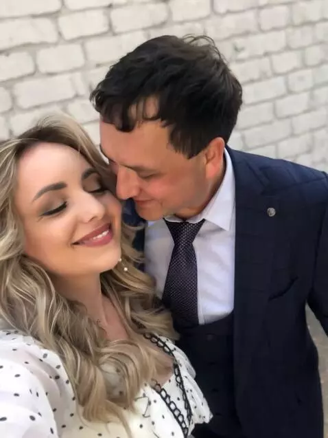 AI Video from prompt: Slow-motion close-up of a couple sharing a genui