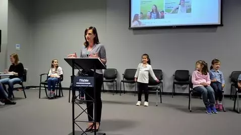 AI Video from prompt: A women conference speaking about mental health 