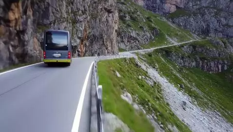 AI Video from prompt: bus driving off a clif