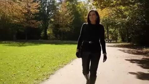 AI Video from prompt: A mature woman in a black nylon bodysuit with sl